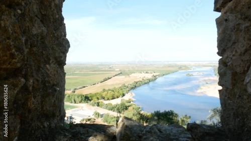 Window view to a valley and a river in Portugal