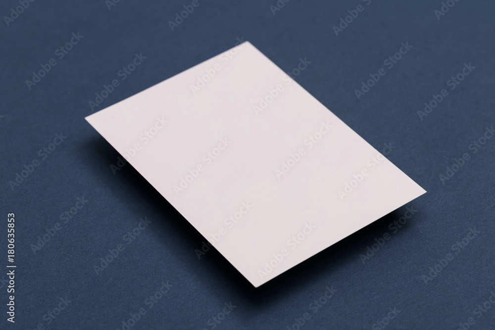 Blank white business card postcard flyer on a blue background Blank white business card postcard flyer on a blue background