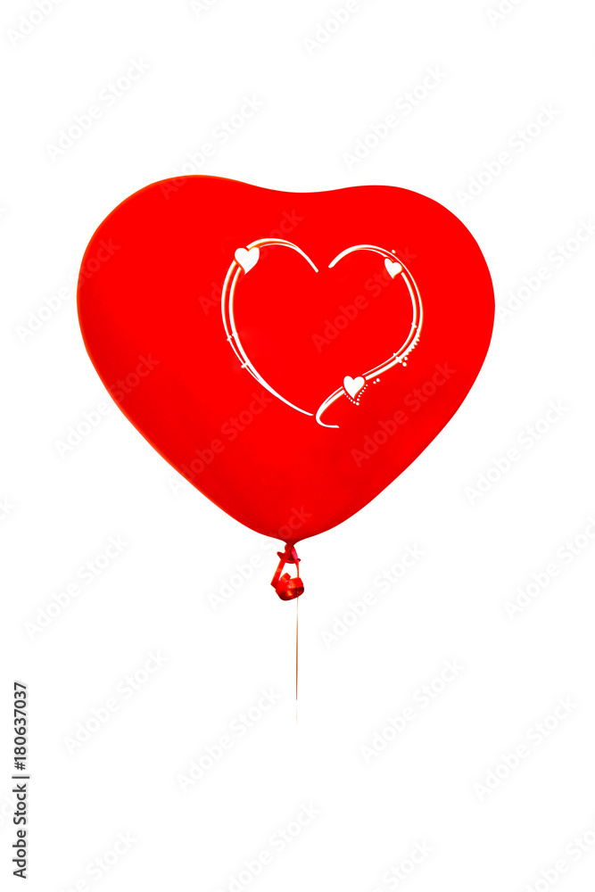 Inflatable balloon, red in the shape of heart, isolated on white background. Close-up, flying toy
