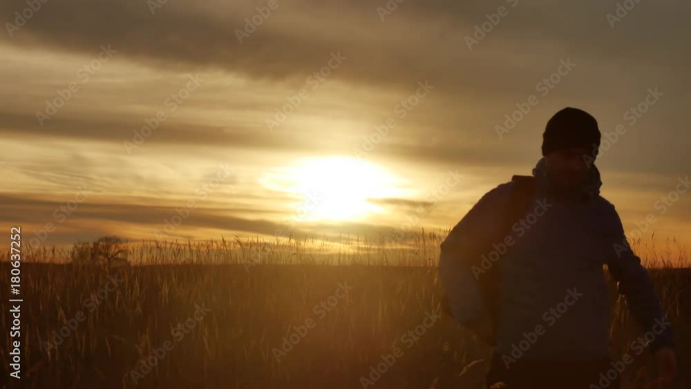 silhouette of man at sunrise in field nature silhouette of man at sunrise in field nature