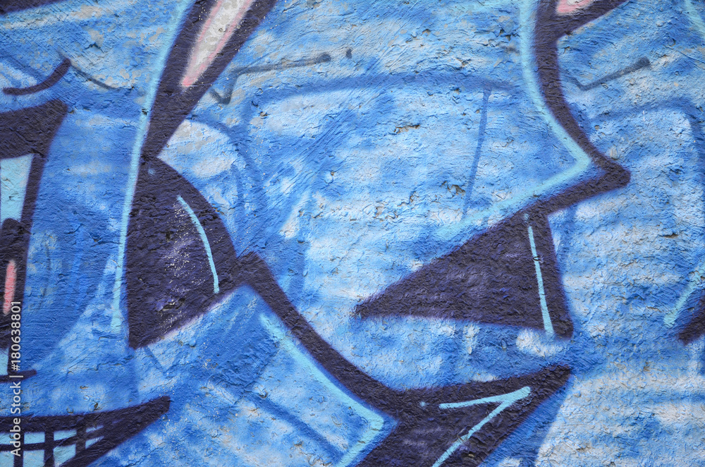 Fotka „Texture of a fragment of the wall with graffiti painting, which