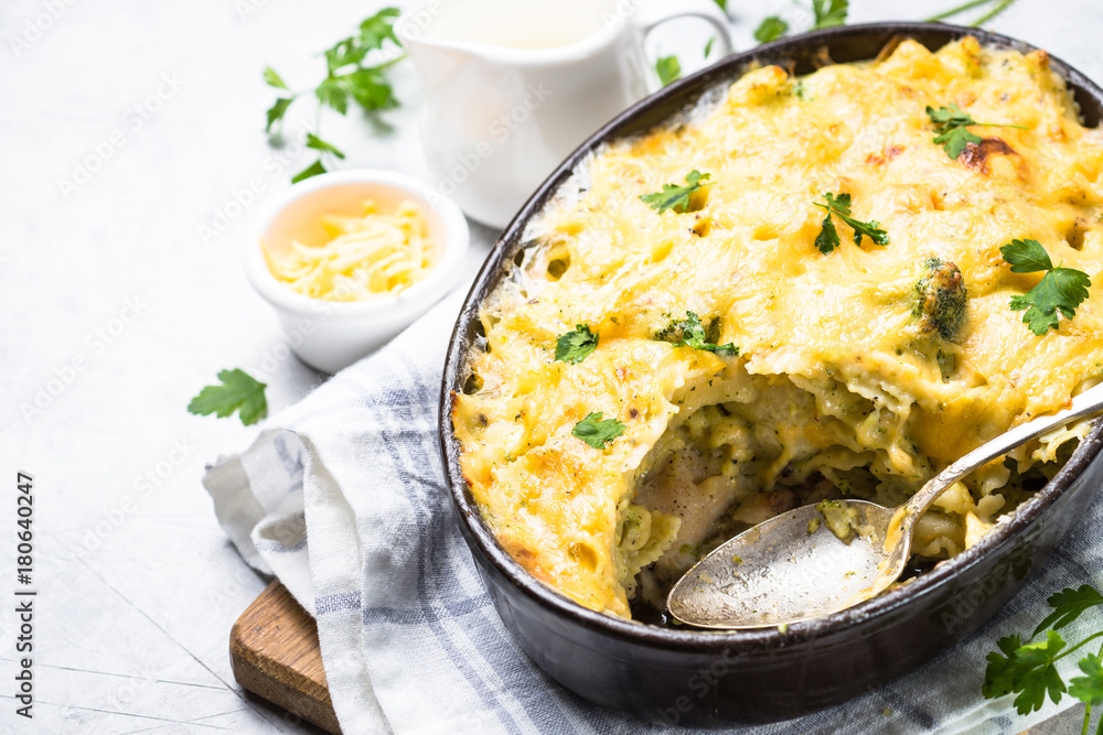 Gratin or Casserole in baking dish. Pasta fish cheese and vegetables. Gratin or Casserole in baking dish. Pasta fish cheese and vegetables.