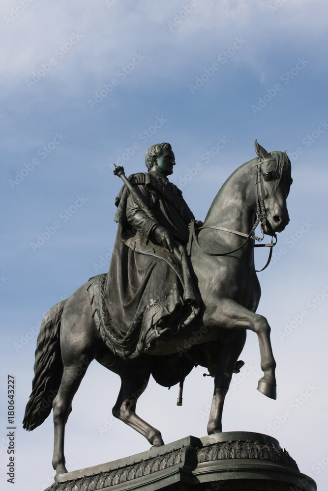 Details on equestrian Statue of King John of Saxony (Konig Johann I. von Sachsen) at Theaterplatz in Dresden, Germany