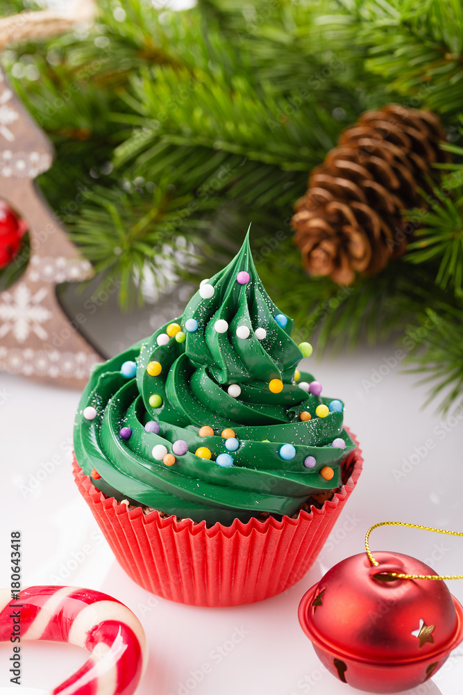 Christmas green cupcake in red cup