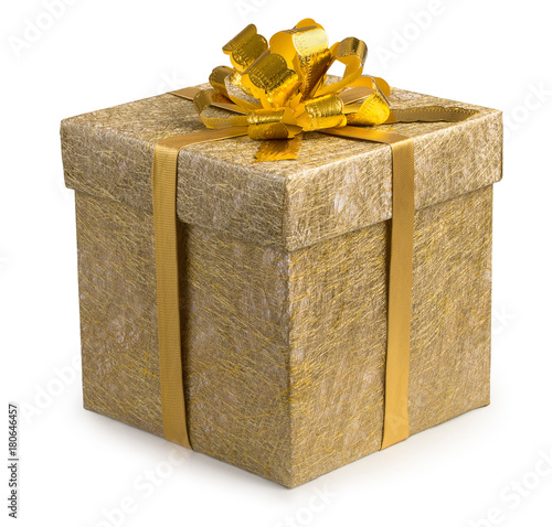 Gift box wrapped in nice golden reticulate paper with gold ribbon bow isolated on a white background.