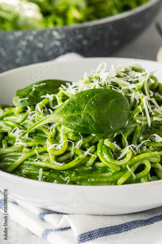 Spaghetti. Green spaghetti with spinach and parmesan. Italian and mediterranean cuisine