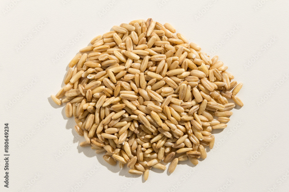Oat cereal grain. Pile of grains. Top view. Oat cereal grain. Pile of grains. Top view.