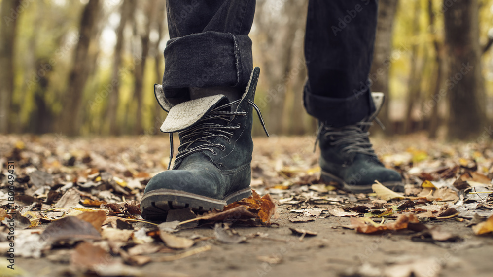 feet boots autumn leaves