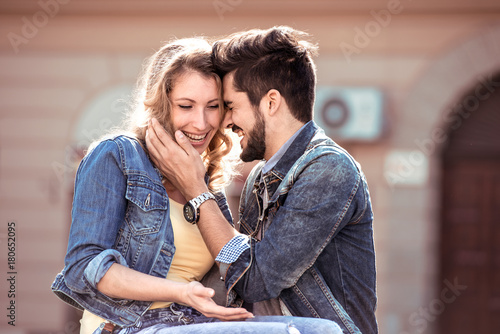Young couple in love,hugging on the street