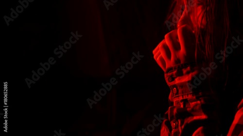 Teen girl afraid in the dark.