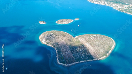 Aerial view of beautiful heart-shaped Island of Galesnjak, also called Island of Love, in Pasman channel, Croatia photo