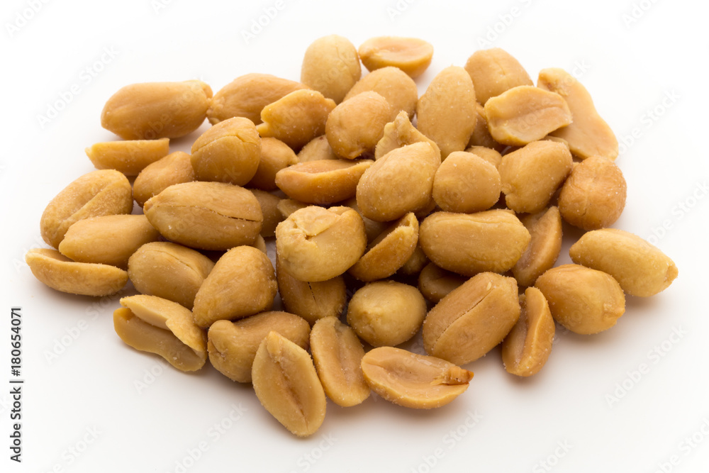 Peeled peanuts on the isolated background. Peeled peanuts on the isolated background.