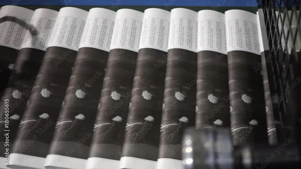 Print the newspaper from a short distance. The process of offset and roll printing. Production of the newspaper. Paper passing from the press. Print the newspaper from a short distance. The process of offset and roll printing. Production of the newspaper. Paper passing from the press.