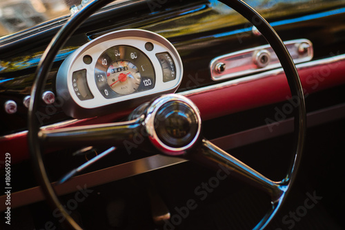 Close-up of steering wheel of a vintage car © bodiaphoto
