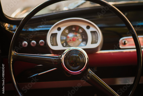 Close-up of steering wheel of a vintage car © bodiaphoto
