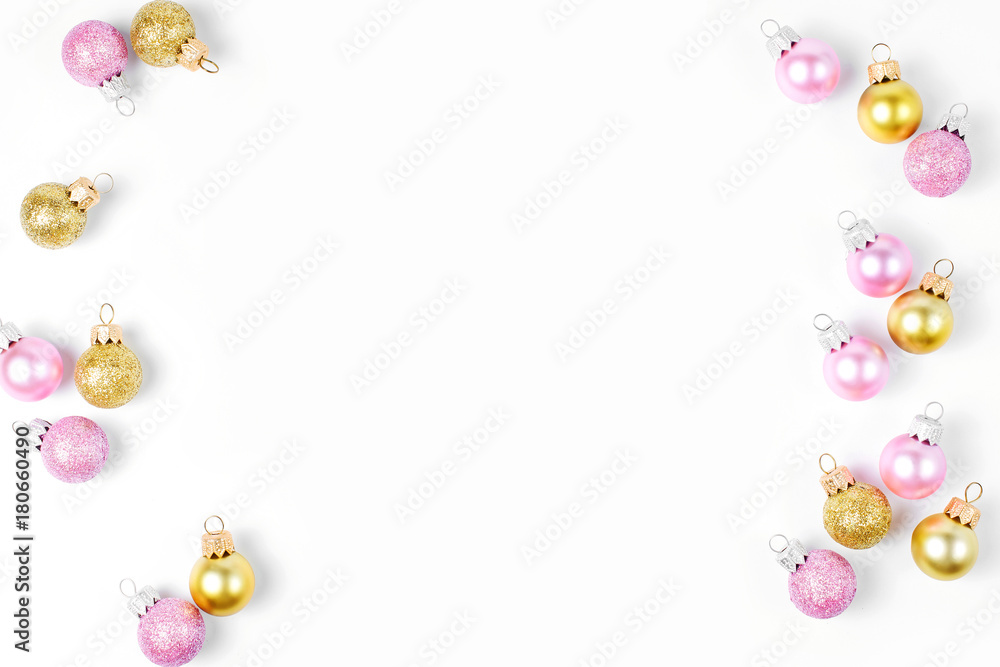 Stylish arrangement, frame of bright christmas balls on white background. Flat lay, top view Stylish arrangement, frame of bright christmas balls on white background. Flat lay, top view