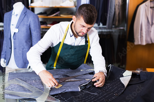 Konstfotografi Male tailor working at workshop