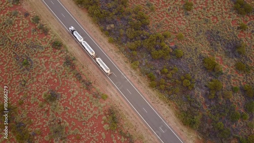 Truck driving on road aerial view photo