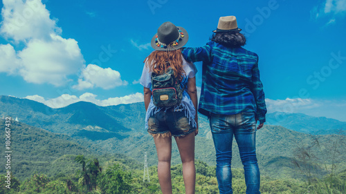 Lover women and men asians travel relax in the holiday. Stand touch nature on the Moutain. Thailand