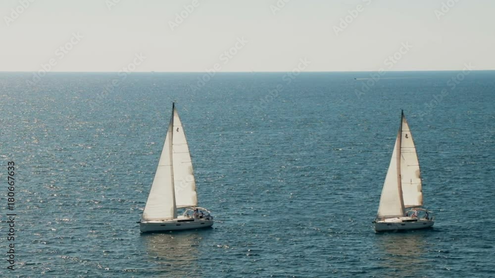 A sailboats on the horizon in the beautiful Adriatic sea A sailboats on the horizon in the beautiful Adriatic sea