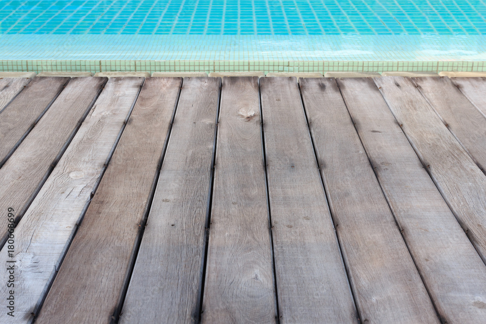 Wood floor texture to swimming pool background. Wood floor texture to swimming pool background.