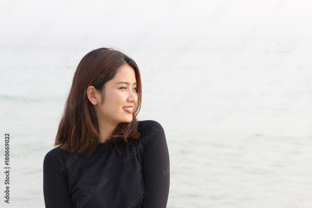 Asian beautiful woman relax on the beach background. Asian beautiful woman relax on the beach background.