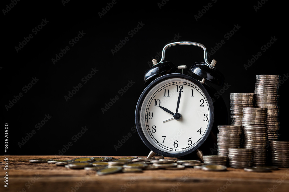 business financial ideas concept with coins stack and alarmclock isolate background with free copyspace for your creativity ideas text business financial ideas concept with coins stack and alarmclock isolate background with free copyspace for your creativity ideas text
