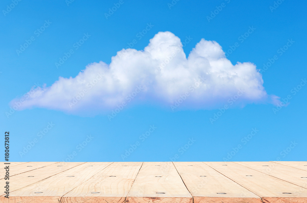 empty wooden table in the nice blue sky. background for product display template