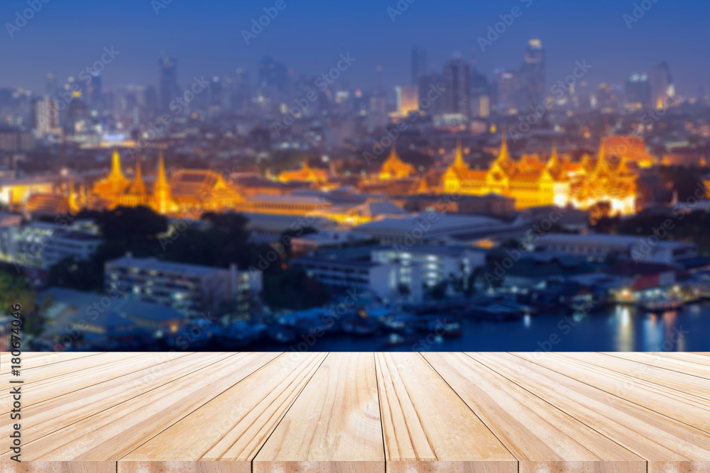 empty wooden table in  template Grand palace at twilight in Bangkok, Thailand. the background for product display