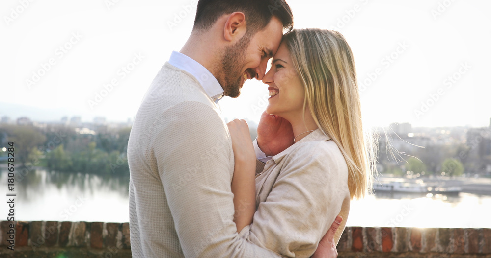 Happy couple in love hugging outdoor Happy couple in love hugging outdoor