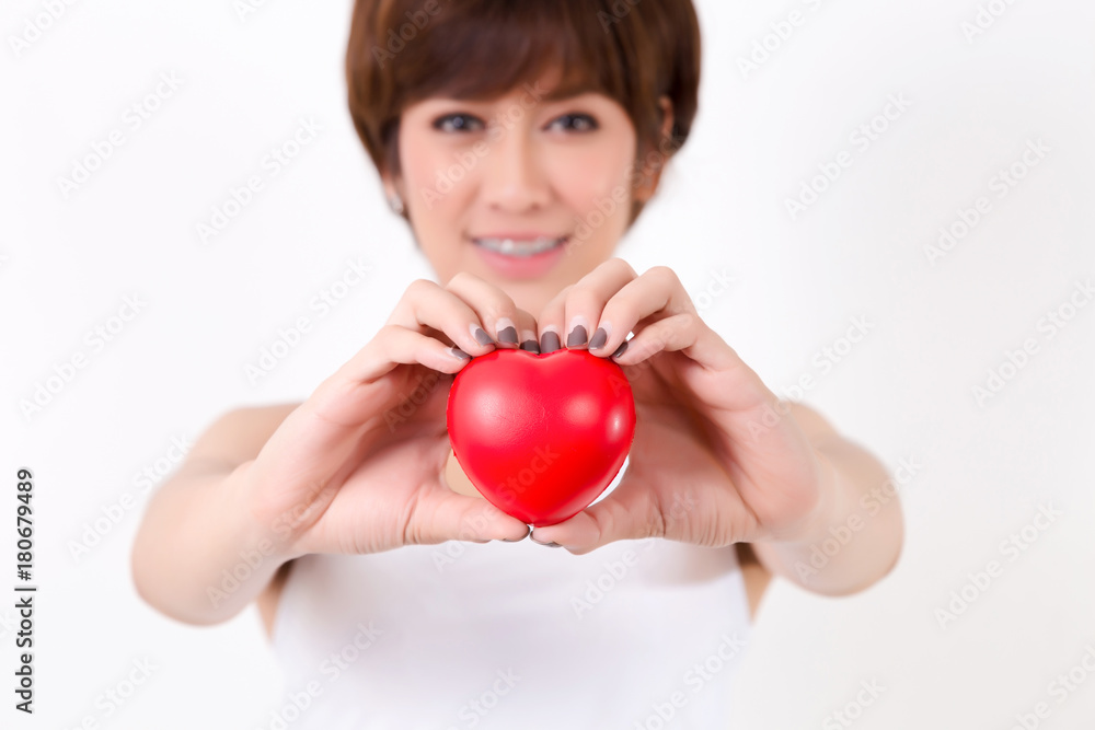 Beautiful young asia woman with red heart. Isolated on white background. Studio lighting. Concept for healthy. Beautiful young asia woman with red heart. Isolated on white background. Studio lighting. Concept for healthy.