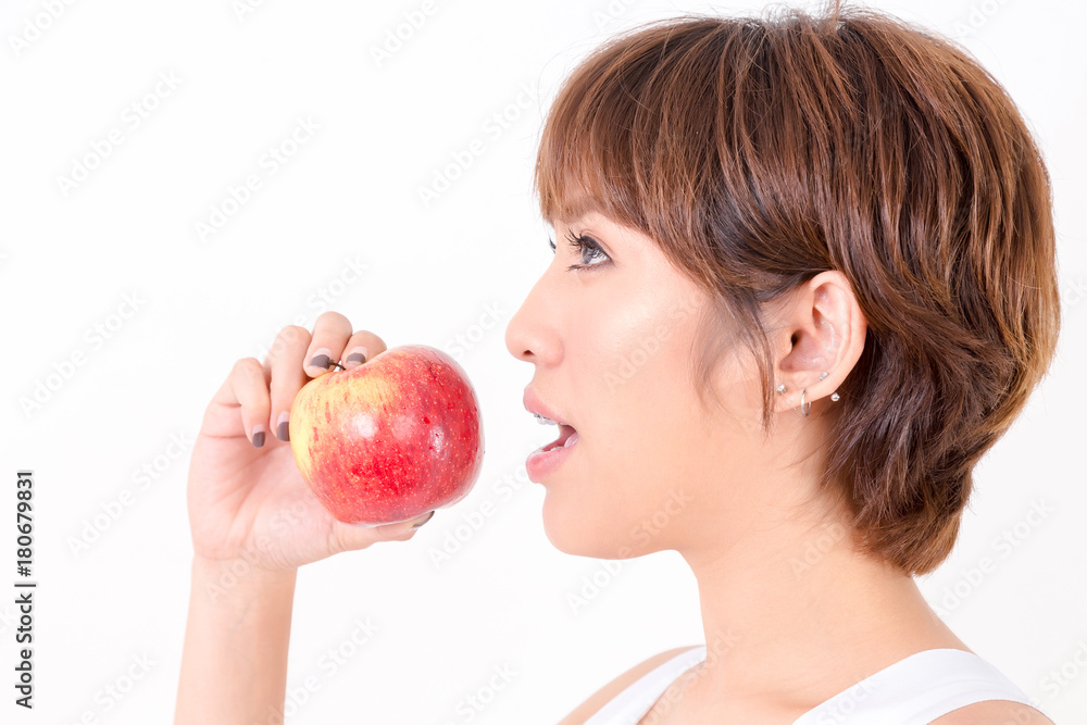 Beautifulyoung Asia woman with healthy food. Isolated on white background. Studio lighting. Concept for healthy. Beautifulyoung Asia woman with healthy food. Isolated on white background. Studio lighting. Concept for healthy.