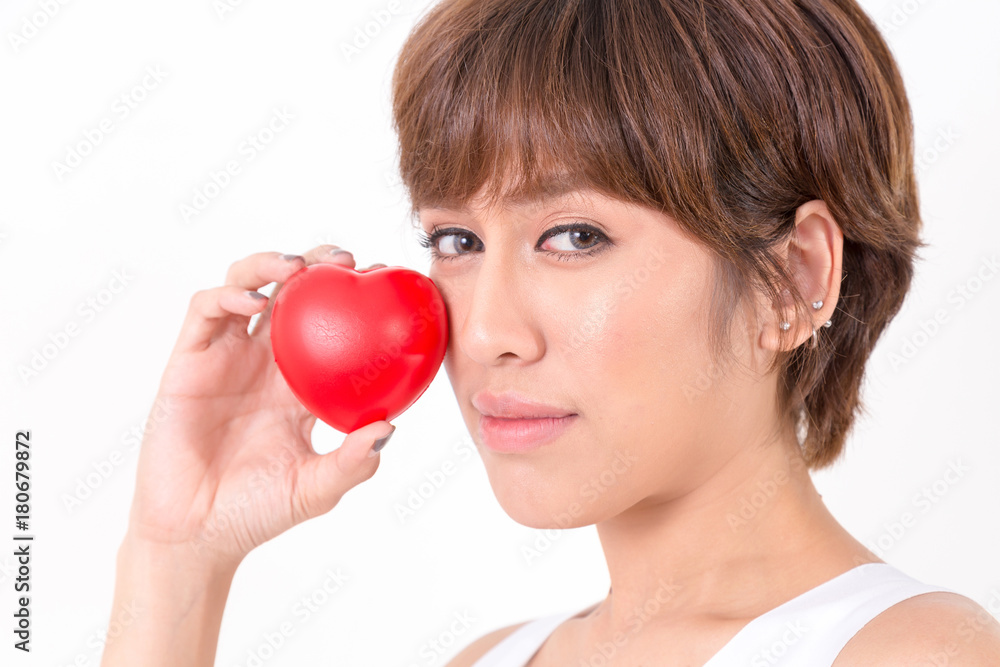 Beautiful young asia woman with red heart. Isolated on white background. Studio lighting. Concept for healthy. Beautiful young asia woman with red heart. Isolated on white background. Studio lighting. Concept for healthy.