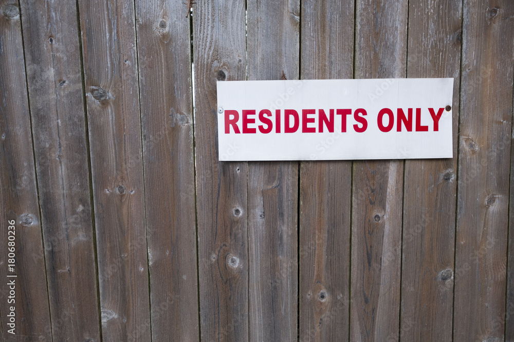residents only sign on wood fence residents only sign on wood fence