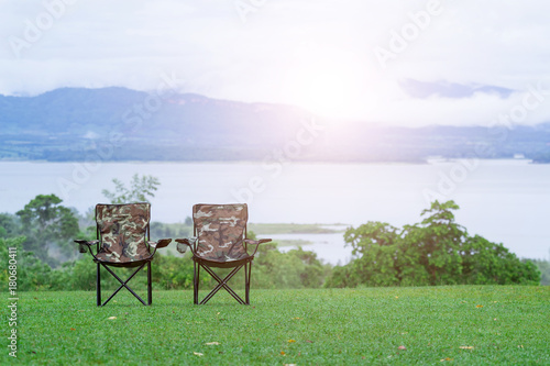 two empty  folding chairs for Outdoor Camping © PRASERT