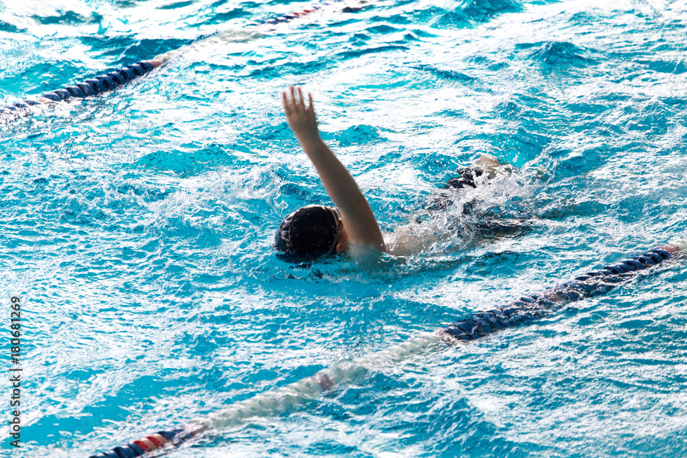 boy on a swim in a sports pool