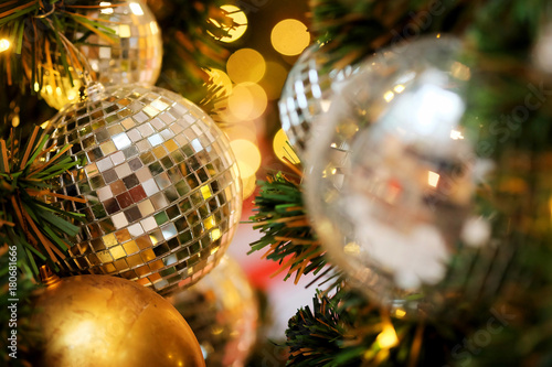 joy to decorative with mirror ball or Christmas ball to decorative for Christmas festival with bokeh background. Have some space for write wording