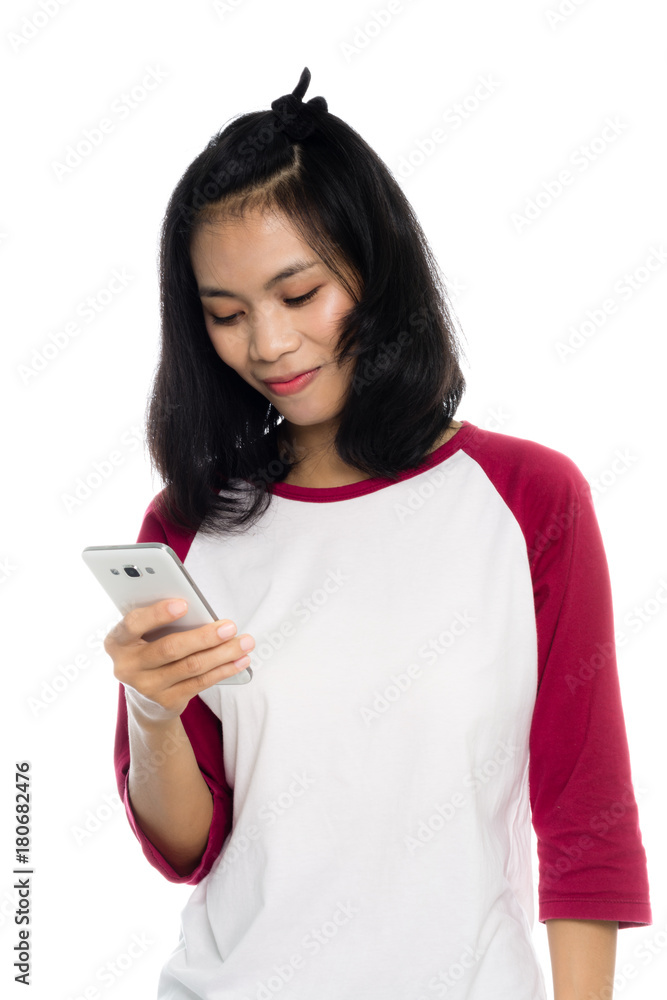 Portrait of a beautiful woman looking on smart phone. Isolated on white background