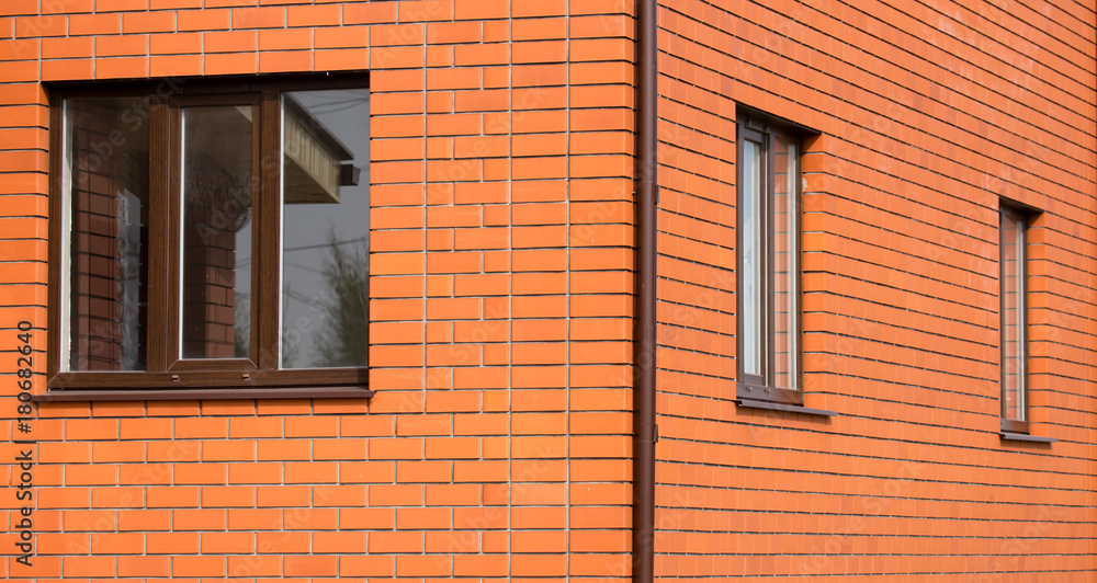 window in a red brick house