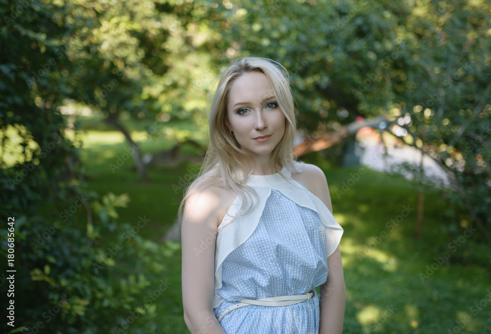 Outdoors portrait of beautiful young woman. Selective focus. Outdoors portrait of beautiful young woman. Selective focus.