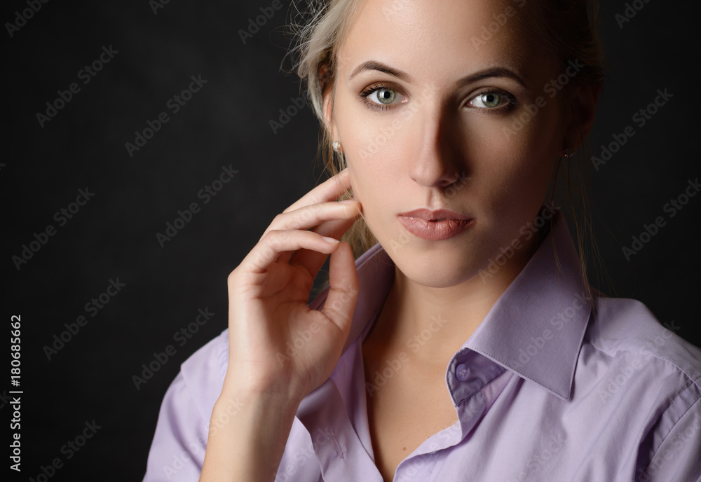 Portrait of beautiful sensual woman with green eyes. Studio shot. Portrait of beautiful sensual woman with green eyes. Studio shot.