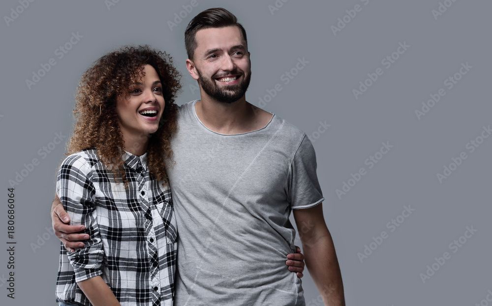 Fototapeta premium young couple discussing their dreams and pointing forward.