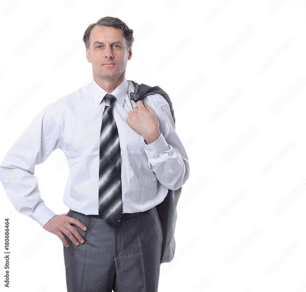 in all growth.Serious man in suit holding jacket in all growth.Serious man in suit holding jacket