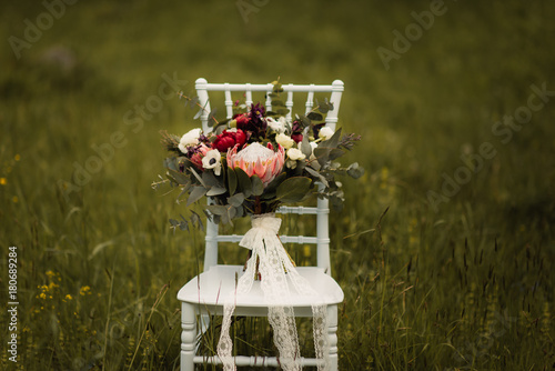 wedding bouquet on a chiavari chair photo