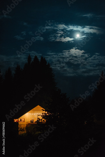 a barn and the moon at night