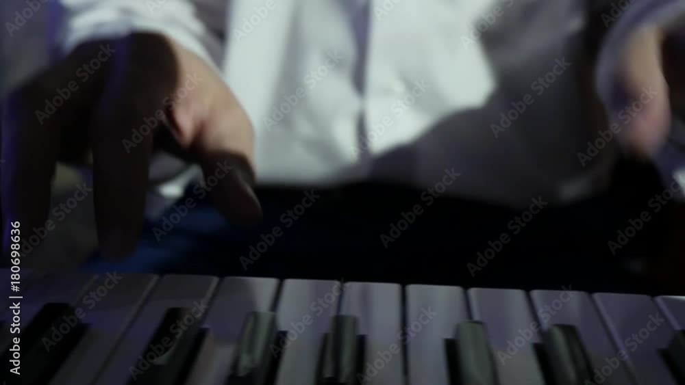 musician playing the electric piano on concert stage Bright stage ...