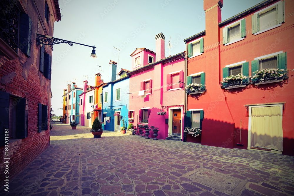 colorful houses of the island of Burano near VENICE in Italy wit
