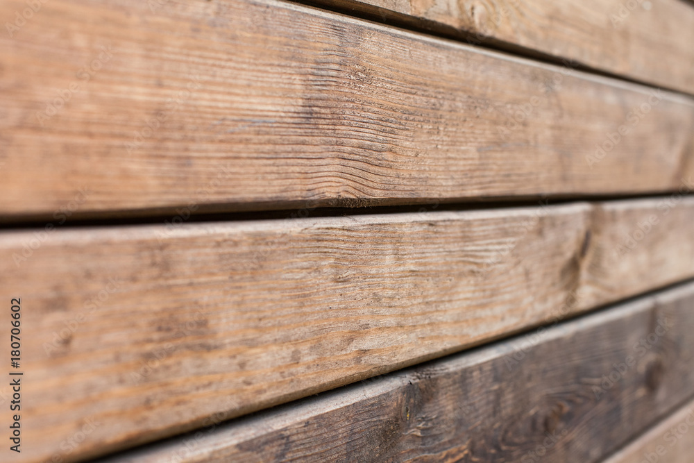 Naklejka premium brown natural wood board use for background.