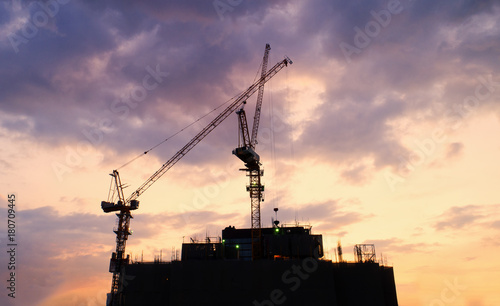 Construction site with cranes. Construction workers are building.Aerial view.Top view. Buildings background