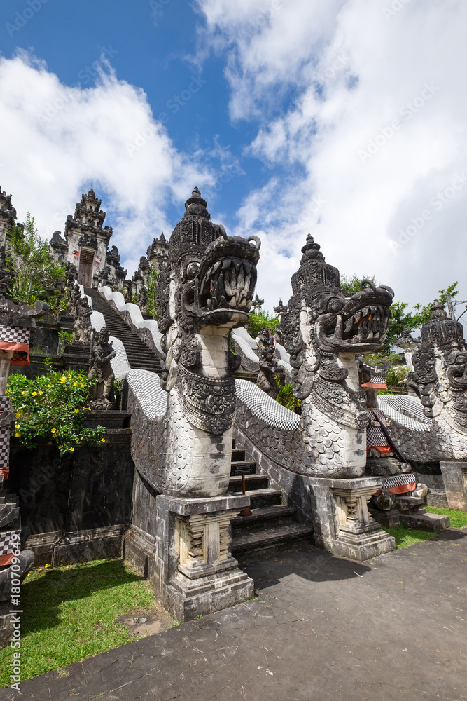 Fototapeta premium The sculpture in front of stair in Pura Penataran Agung Lempuyang in Bali, indonesia